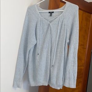 Light blue Jones NY sweater w/ criss-cross v-neck.